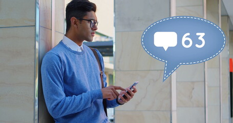 Poster - Young man using smartphone outdoors, receiving 63 notifications, looking focused