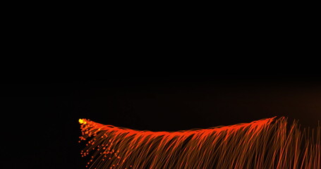 Poster - image of orange light trails appearing over black background