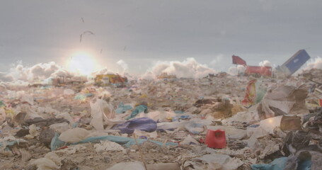 Poster - Image of clouds at sunset moving fast over waste disposal site