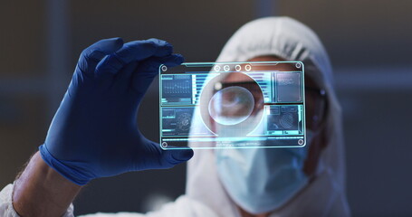 Poster - Image of male scientist holding interactive screen with medical data processing