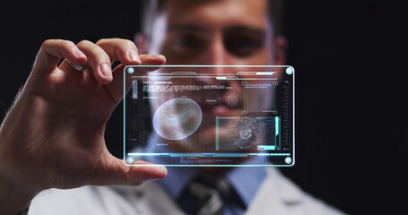Poster - Image of male scientist holding interactive screen with medical data processing