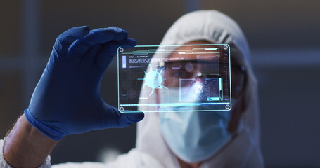 Poster - Image of male scientist holding digital screen with covid 19 cell