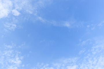 Wall Mural - beautiful blue sky and white fluffy group of clouds with sunrise in the morning, natural background