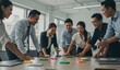 © Akstem - Diverse team collaborates around a table, strategizing, innovating, and planning,