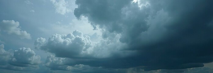 Wall Mural - heavy gray storm clouds. gloomy sky background for design
