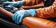 © xartproduction - Car Interior Detailing with Protective Gloves