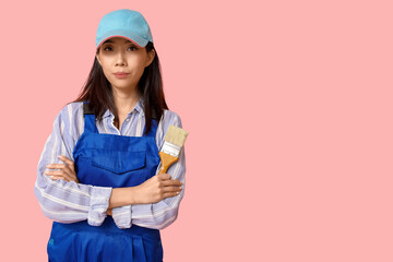 Wall Mural - female asian painter with brush on pink background