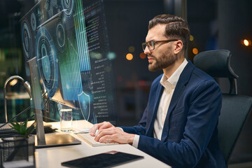 professional analyst using modern technology for cybersecurity solutions in contemporary work enviro