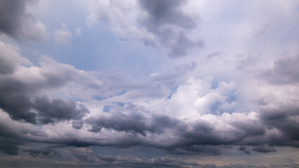 Wall Mural - dark sky with stormy clouds. dramatic sky rain,dark clouds before a thunder-storm.