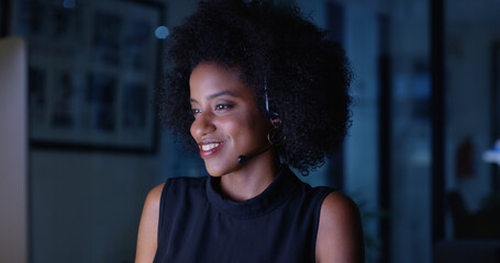 Fototapete - Overtime, happy or black woman in call center with sales, feedback and smile on computer. Virtual assistant, consultant or customer service agent with headset, online support or business in night