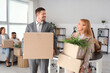 © Pixel-Shot - Business people with boxes in office on moving day