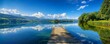 © Paul - Peaceful lakeside scene featuring a rustic wooden pier.