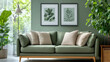 © khemthong - Green mint sofa against green wall with poster frame Boho style interior design of modern living room