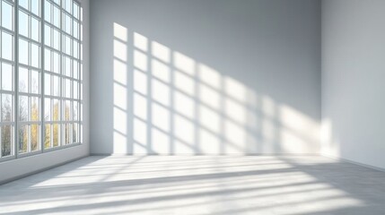 Poster - Sunlight Illuminates Minimalist Room with Large Window Casting Shadows on White Walls and Light Gray Floor Creating a Serene and Calming Atmosphere
