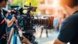 © BlackLion - Large camera setup captures a bustling street scene during a sunny afternoon in an urban area with filmmakers at work
