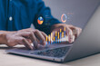© PB Studio Photo - Man analyzing data working on computer , concept of business data analysis using statistical graphs, data management structure work on dashboard, evaluate and measure business performance