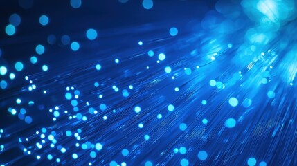 Fototapete - Thin light fiber optic strands in high-tech blue illumination, symbolizing modern internet technology