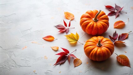 Aufkleber - Autumnal Still Life Two Small Pumpkins Adorned with Colorful Fall Leaves on a Textured Surface
