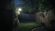 © UMI - Night backyard garden lit lamp fence privacy