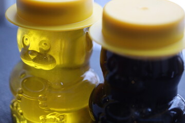 Aufkleber - A jar of a bear filled with honey.