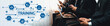 © InfiniteFlow - Asian job applicant in identical formal wear sitting in waiting room for job interview. Office worker or business people working in cramped room together using laptop and phone. Trailblazing Amity