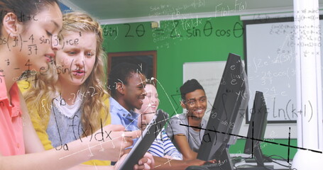 Poster - In school, students using computers collaborating on math project, staying engaged
