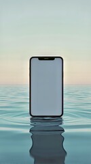 Poster - Smartphone stands tall amidst the gentle waves of serene ocean water, reflecting on the calm surface.
