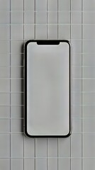 Poster - Sleek smartphone with blank white screen on textured gray background for modern tech design projects.