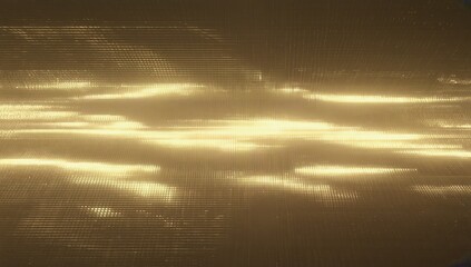 Poster - Golden abstract background featuring soft waves and reflective textures under ambient light for artistic design