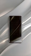 Poster - Sleek device laying on a reflective surface with light reflecting off its smooth dark display.
