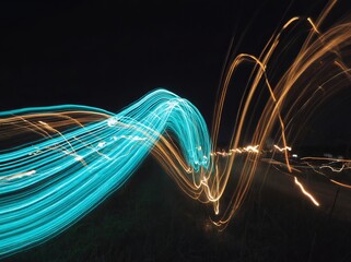 Poster - Colorful light trails create dynamic patterns against a dark background, showcasing abstract beauty and movement at night