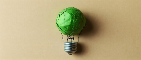 Poster - A green, geometric light bulb sits on a beige background, symbolizing innovation and eco-friendly energy solutions.