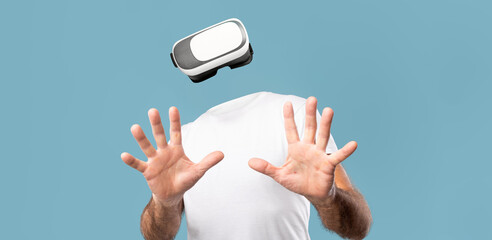 Poster - A person with a virtual reality headset engages with immersive technology. They appear to be reaching out, fully engaged in a digital environment, showcasing modern gadgetry and trends.