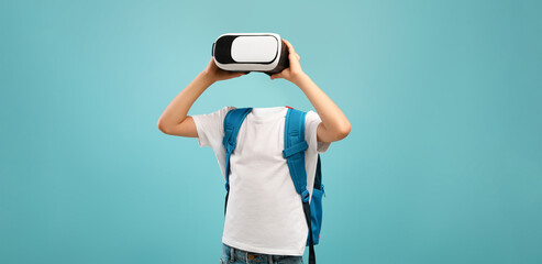 Poster - A schooler engages with virtual reality technology, donning a headset while standing against a vibrant blue background.