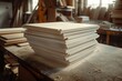 © CojanAI - High angle shot shows a stack of white plywood boards neatly arranged on a workshop table with sawdust