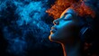 © gelas - Woman with closed eyes enveloped in colorful blue and orange smoke