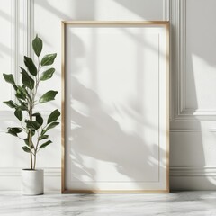 Poster - Minimalist Interior with Empty Frame, Plant, and Sunlight Casting Shadows on a Textured Wall