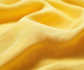 Poster - golden canvas of comfort: an eye-level shot showcases a radiant, golden-yellow fabric. the soft, tex