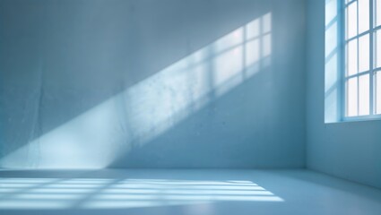 Poster - bright sunlight streaming into a minimalist room with pale blue walls and large windows creating a s