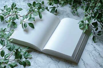 Poster - Blank book surrounded by green leaves on a marble surface invites creativity and imagination in a serene setting