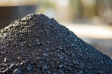 Poster - Tungsten ore pile on blurred background in outdoor setting Generative AI