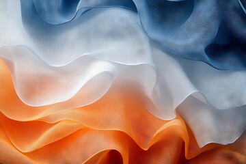Aufkleber - Flowing fabric in shades of orange, white, and blue showcases intricate textures and patterns for artistic appeal
