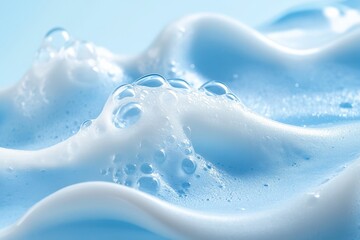 Aufkleber - Close-up of light blue foam creating soft waves with bubbles on a smooth surface during a serene setting