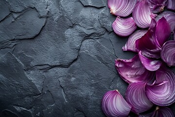 Poster - Purple onion slices arranged on a dark stone background showcasing their vibrant color and texture in a kitchen setting