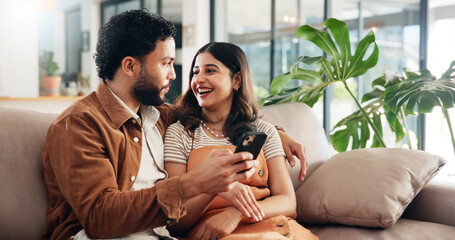 Poster - Home, funny or couple on sofa, smartphone or smile with social media, comedy video or relationship. Digital app, man or woman on couch, cellphone or laughing with internet, conversation or marriage