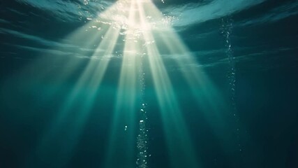 Poster - Sunlight Rays Illuminating the Depths of a Serene Underwater Scene with Vibrant Blue Tones and Gentle Water Movements