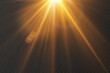 © Yuliia - Golden flash of light, lens flare. On a transparent background.