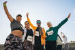 © Jacob Lund - Diverse group celebrating after completing a half marathon