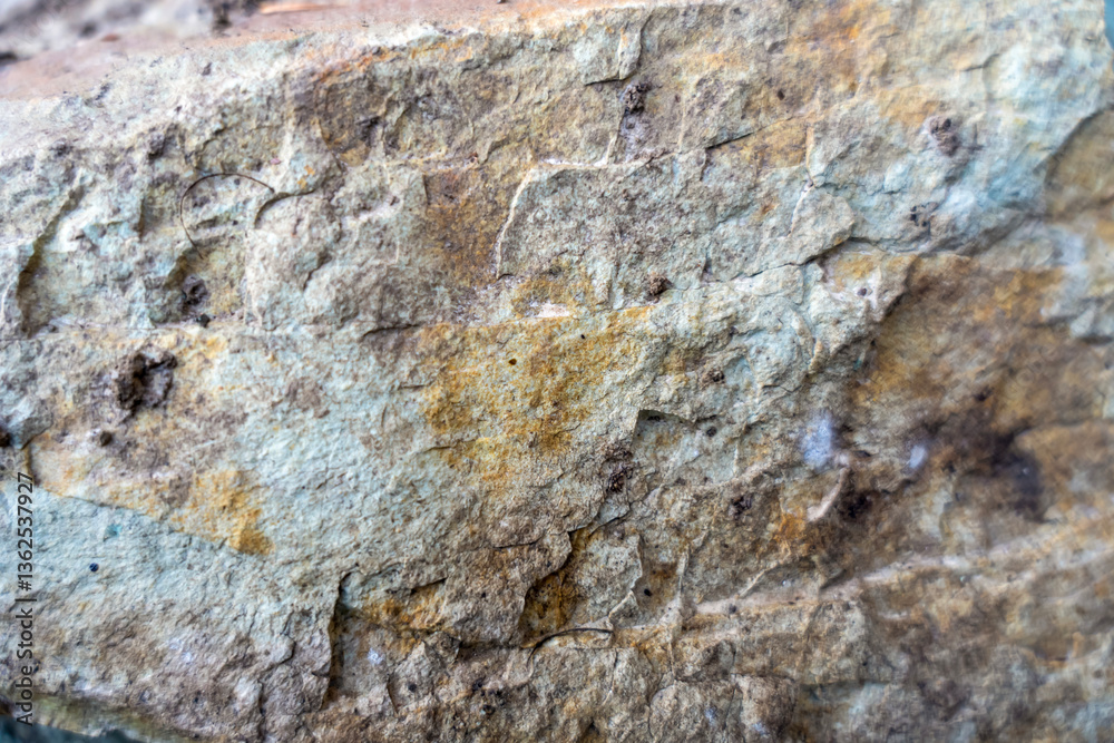 Big beautiful stone on the ground , stone background 