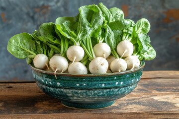 Poster - Fresh organic radishes and greens in a blue ceramic bowl on rustic wooden table